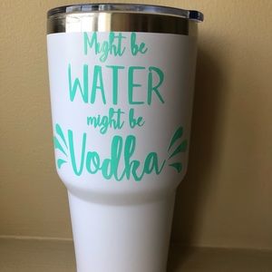 Might be water might be vodka tumbler